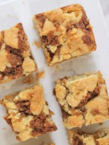Pumpkin Cinnamon Roll Cheesecake Cookie Bars